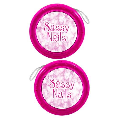 Personalized yoyo personalized with pink marble pattern and the sayings "Sassy Nails" and "From hand to toe"