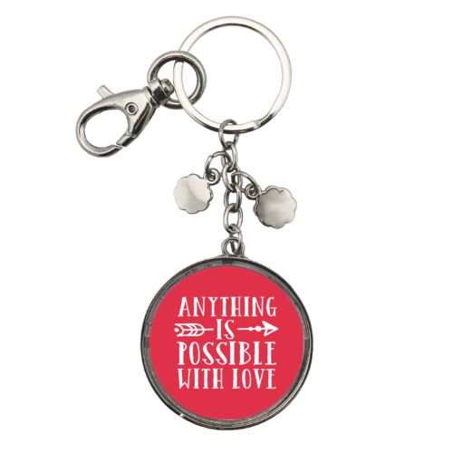 Personalized metal keychain personalized with the saying "anything is possible with love"