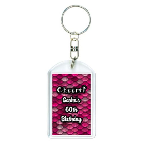 Personalized plastic keychain personalized with pink mermaid pattern and the saying "Cheers! Sasha's 60th Birthday"