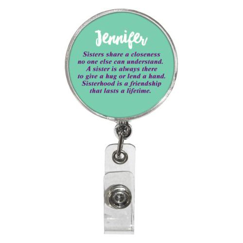 Personalized badge reel personalized with the sayings "Sisters share a closeness no one else can understand. A sister is always there to give a hug or lend a hand. Sisterhood is a friendship that lasts a lifetime." and "Jennifer"