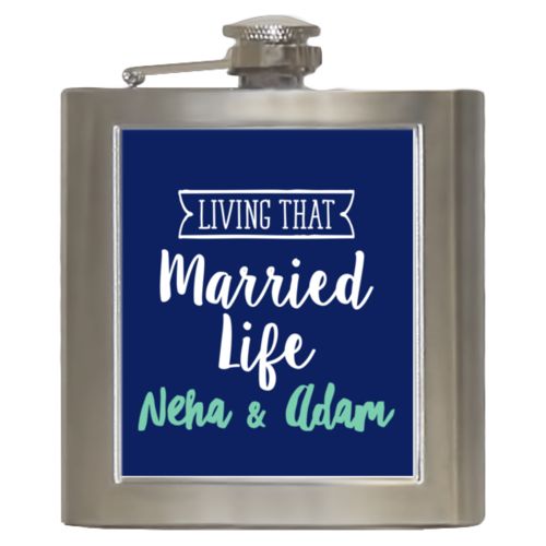 Personalized 6oz flask personalized with the sayings "Neha & Adam" and "living that married life"