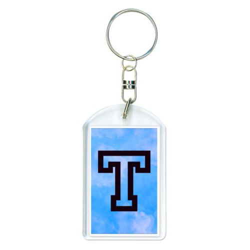 Personalized keychain personalized with light blue cloud pattern and the saying "T"