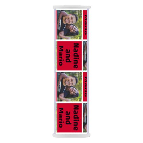 Personalized backup phone charger personalized with a photo and the saying "Nadine and Mario" in black and apple red