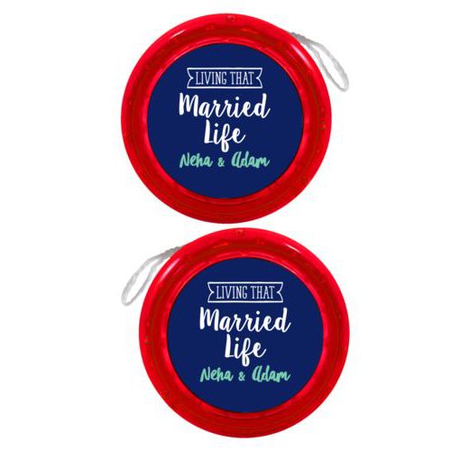 Personalized yoyo personalized with the sayings "Neha & Adam" and "living that married life"