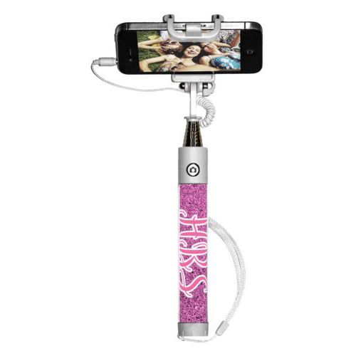Personalized selfie stick personalized with light pink glitter pattern and the saying "HBS"
