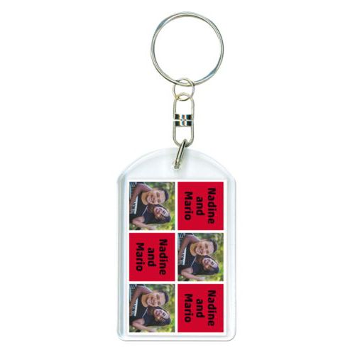 Personalized plastic keychain personalized with a photo and the saying "Nadine and Mario" in black and apple red