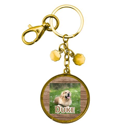 Personalized metal keychain personalized with brown wood pattern and photo and the saying "Duke"