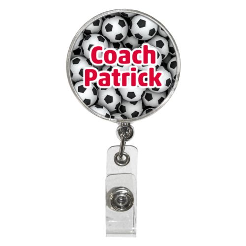 Personalized badge reel personalized with soccer balls pattern and the saying "Coach Patrick"