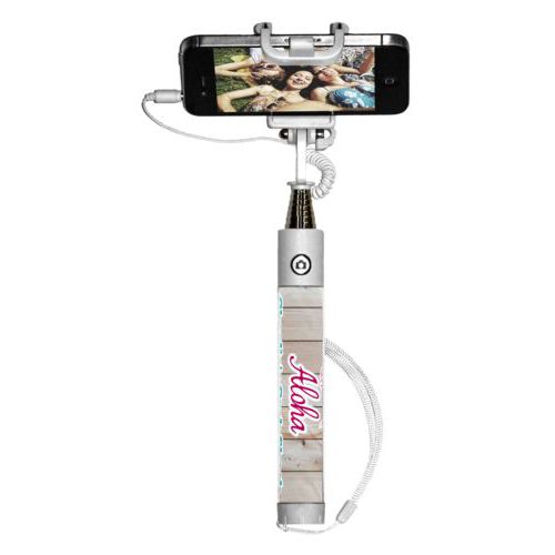 Personalized selfie stick personalized with light wood pattern and the sayings "Aloha" and "Charlie's Crab Shack"