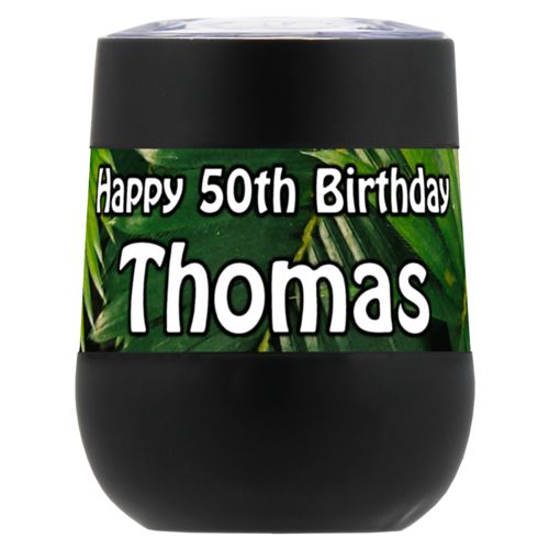 Personalized insulated wine tumbler personalized with plants fern pattern and the saying "Happy 50th Birthday Thomas"
