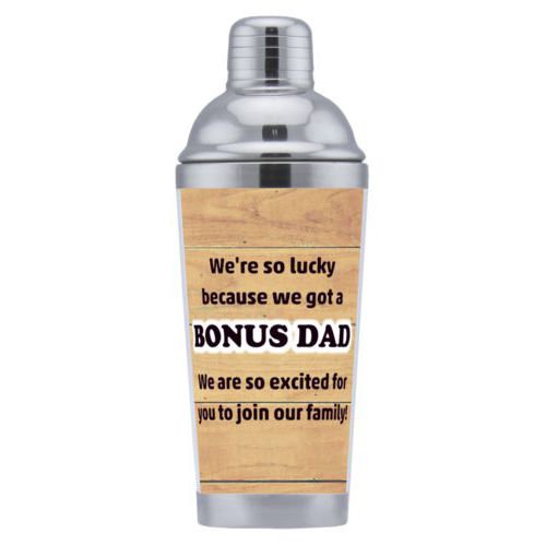 Coctail shaker personalized with natural wood pattern and the sayings "We're so lucky because we got a We are so excited for you to join our family!" and "BONUS DAD"