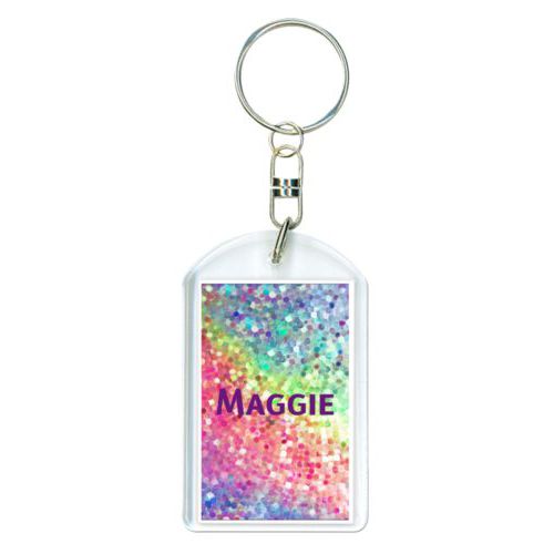 Personalized plastic keychain personalized with glitter pattern and the saying "Maggie"