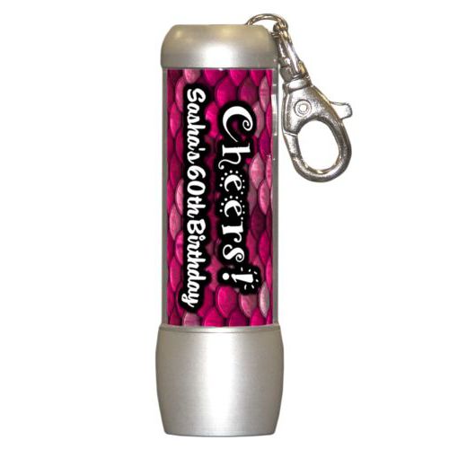 Personalized flashlight personalized with pink mermaid pattern and the saying "Cheers! Sasha's 60th Birthday"