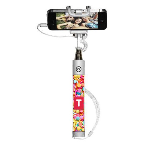 Personalized selfie stick personalized with sweets sweet pattern and initial in red