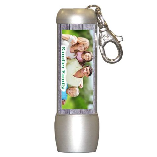 Personalized flashlight personalized with grey wood pattern and photo and the saying "Sandler Family"
