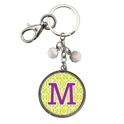 Personalized metal keychain personalized with ironwork pattern and the saying "M"