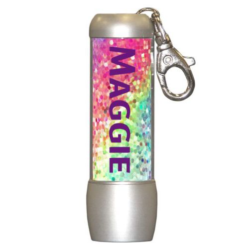 Personalized flashlight personalized with glitter pattern and the saying "Maggie"