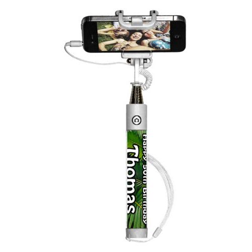 Personalized selfie stick personalized with plants fern pattern and the saying "Happy 50th Birthday Thomas"