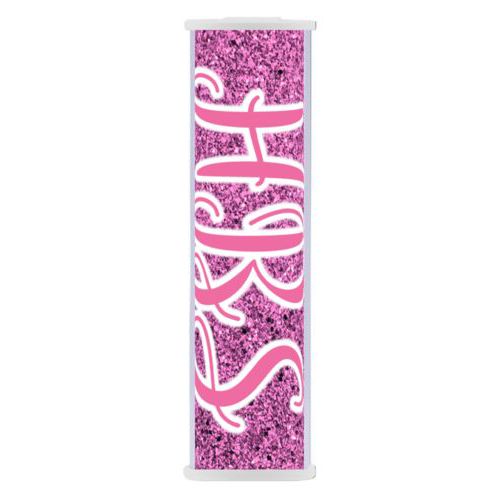 Personalized backup phone charger personalized with light pink glitter pattern and the saying "HBS"