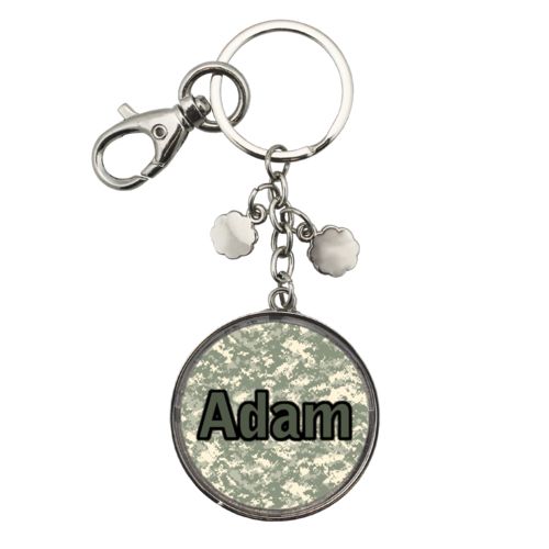 Personalized metal keychain personalized with army camo pattern and the saying "Adam"
