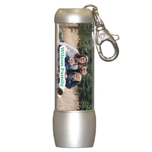 Personalized flashlight personalized with photo and the saying "Wilson Family"