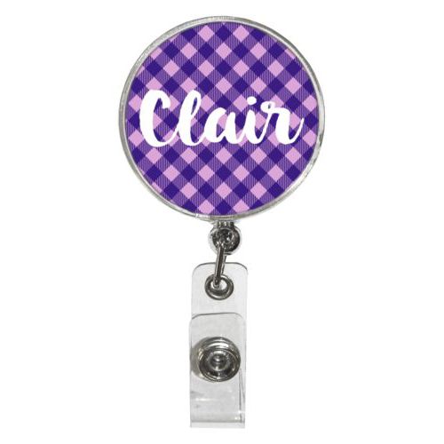 Personalized badge reel personalized with check pattern and the saying "Clair"