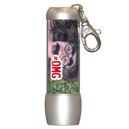 Personalized flashlight personalized with photo and the saying "#omg"