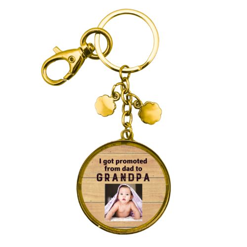 Personalized keychain personalized with natural wood pattern and photo and the saying "I got promoted from dad to grandpa"
