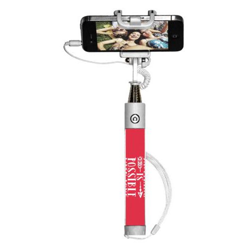 Personalized selfie stick personalized with the saying "anything is possible with love"