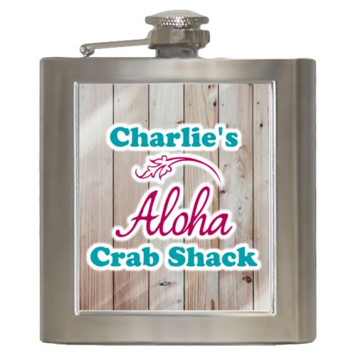 Personalized 6oz flask personalized with light wood pattern and the sayings "Aloha" and "Charlie's Crab Shack"