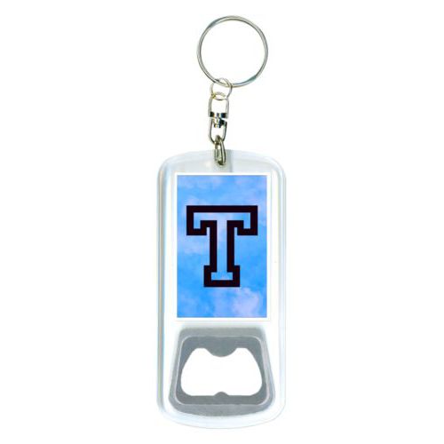 Personalized bottle opener personalized with light blue cloud pattern and the saying "T"