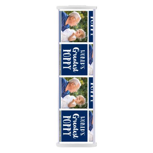 Personalized backup phone charger personalized with a photo and the saying "World's Greatest Poppy" in navy blue and white