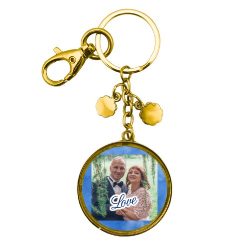 Personalized keychain personalized with blue cloud pattern and photo and the saying "love"