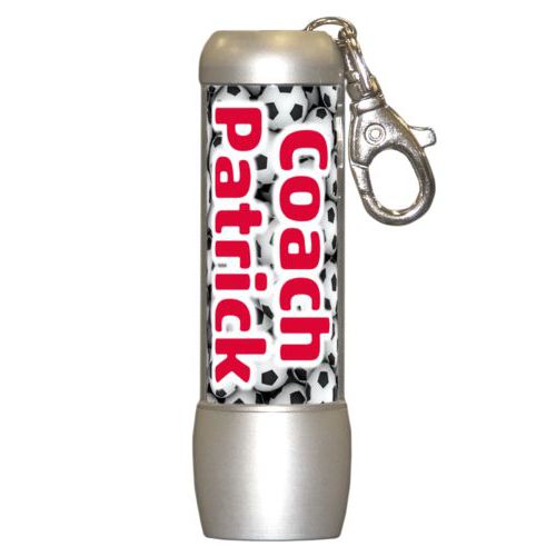Personalized flashlight personalized with soccer balls pattern and the saying "Coach Patrick"