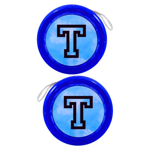 Personalized yoyo personalized with light blue cloud pattern and the saying "T"