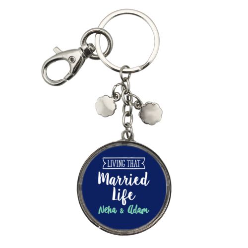 Personalized metal keychain personalized with the sayings "Neha & Adam" and "living that married life"