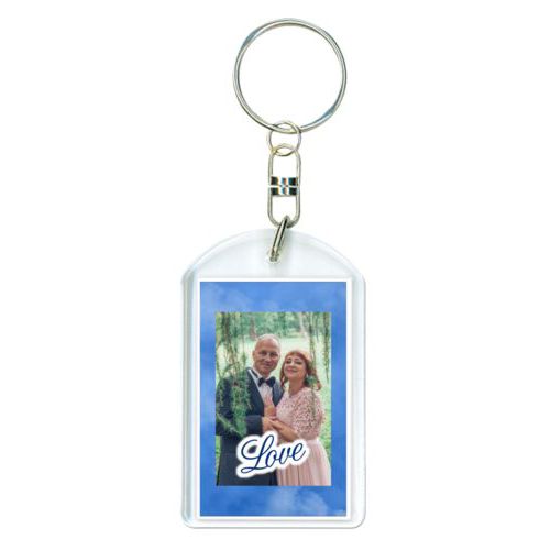 Personalized plastic keychain personalized with blue cloud pattern and photo and the saying "love"