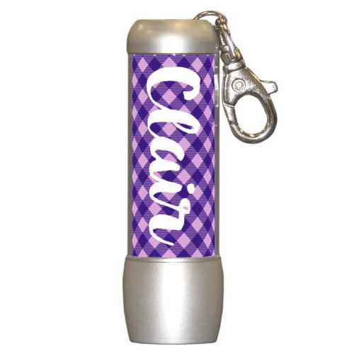 Personalized flashlight personalized with check pattern and the saying "Clair"