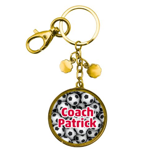 Personalized metal keychain personalized with soccer balls pattern and the saying "Coach Patrick"