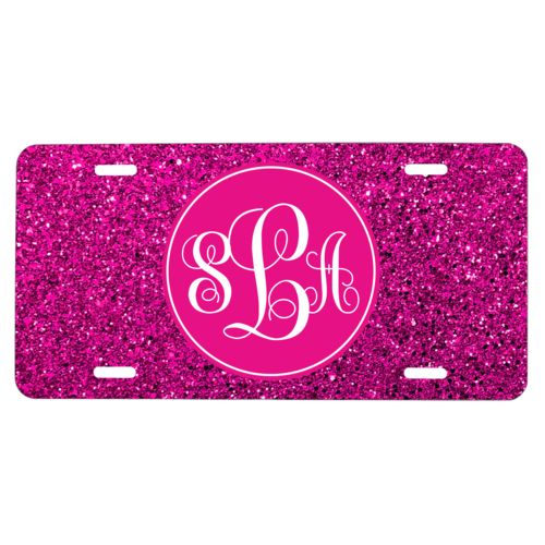 Custom license plate personalized with pink glitter pattern and monogram in bright pink