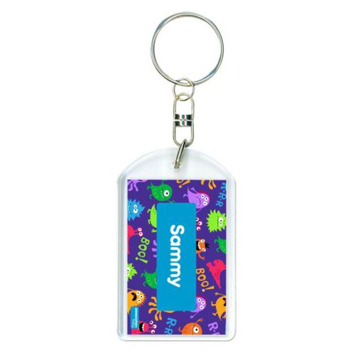 Personalized keychain personalized with monsters pattern and name in caribbean blue