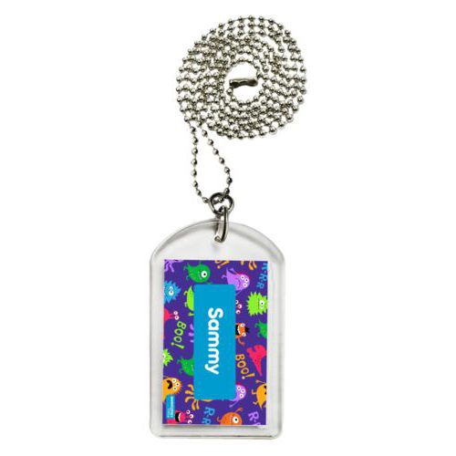 Personalized dog tag personalized with monsters pattern and name in caribbean blue
