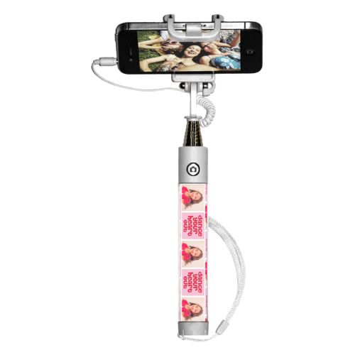Personalized selfie stick personalized with a photo and the saying "dance your heart out" in cherry red and rosy cheeks pink