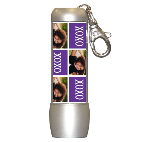 Personalized flashlight personalized with a photo and the saying "xoxo" in purple and white