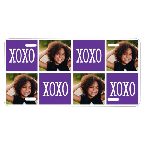 Custom car plate personalized with a photo and the saying "xoxo" in purple and white