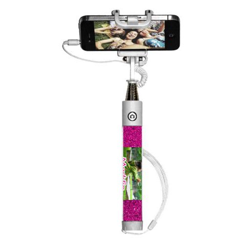 Personalized selfie stick personalized with pink glitter pattern and photo and the saying "Maddie"