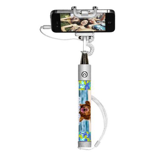 Personalized selfie stick personalized with sup pattern and photo and the saying "Surfer Dog"
