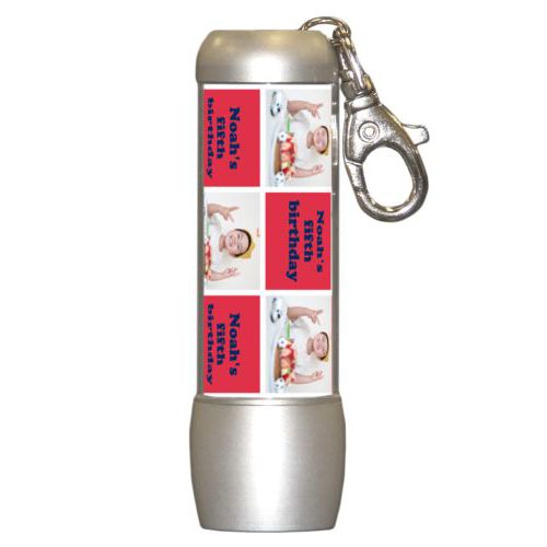 Personalized flashlight personalized with a photo and the saying "Noah's fifth birthday" in navy blue and red