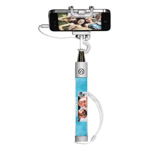 Personalized selfie stick personalized with teal cloud pattern and photo and the saying "here for the Nachos"
