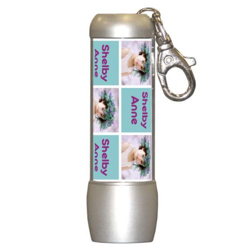 Personalized flashlight personalized with a photo and the saying "Shelby Anne" in dream on - plum and blizzard blue